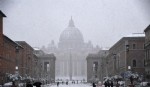 El Coliseo cubierto de nieve (REUTERS/Remo Casilli)